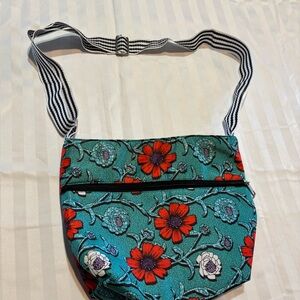 Blue Floral Crossbody Purse With Black and White Striped Strap (Good Condition)